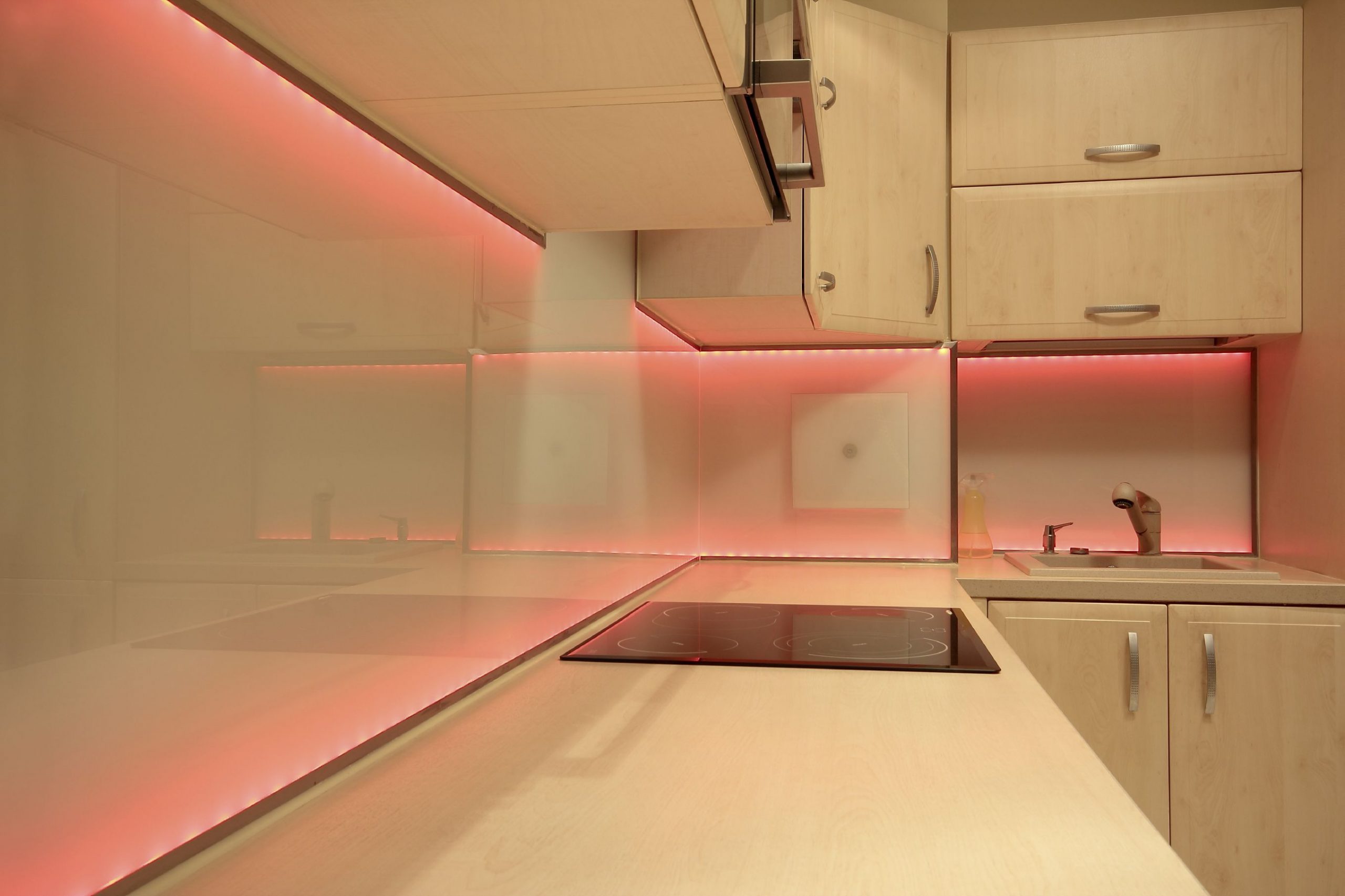 Modern luxury kitchen with red LED lighting